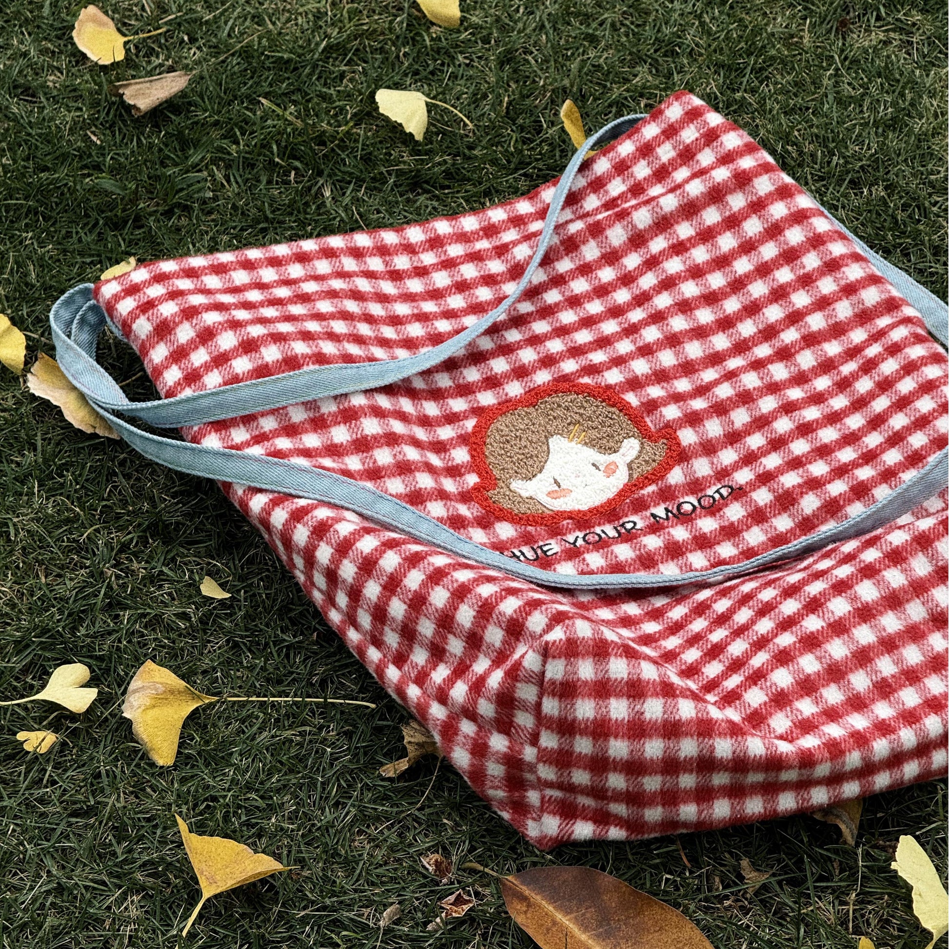 The Little Hue Red and White Square "HUE YOUR MOD" Designer Canvas Bag combines bold energy with timeless style, perfectly reflecting Little Hue’s vibrant personality and playful confidence. The striking red and white color scheme symbolizes passion, energy, and clarity—traits that inspire you to stand out and embrace your unique self.